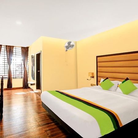 Treebo Doha King Hotel Madikeri Bagian luar foto