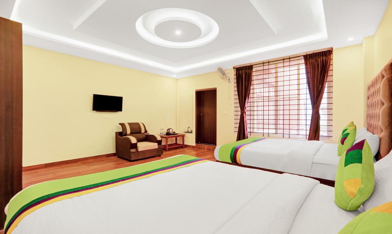 Treebo Doha King Hotel Madikeri Bagian luar foto
